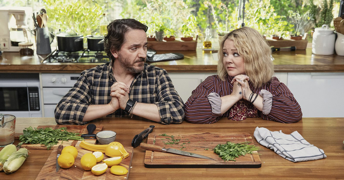 Ben Falcone as Clark Thompson, left, and Melissa McCarthy as Amily Luck in God’s Favorite Idiot