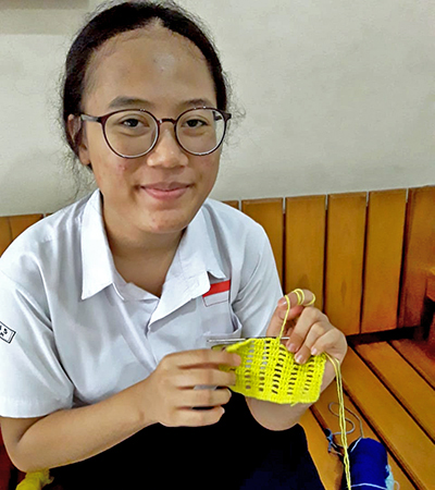 A girl knitting