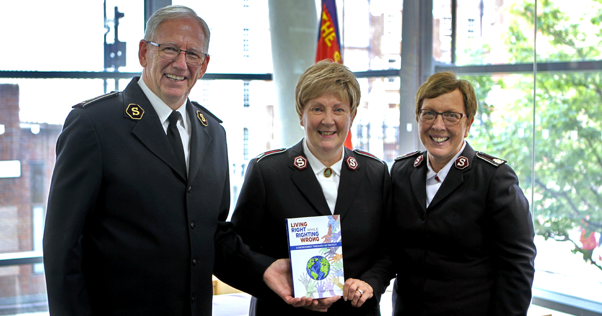 General Brian Peddle and Commissioner Rosalie Peddle, photographed with Colonel Wendy Swan