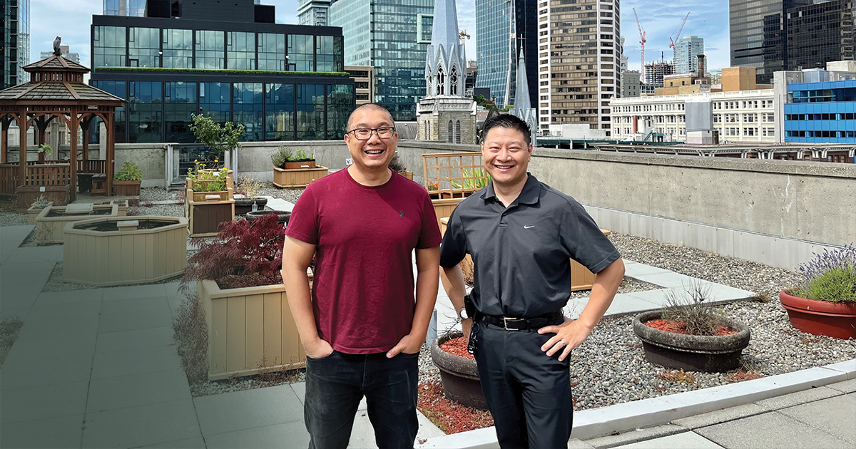 Caseworker and chaplain Andy Cuong Hy (left) with director of community development Alvin Chong