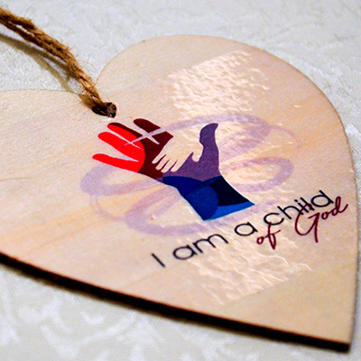 Image of wooden heart with the words 