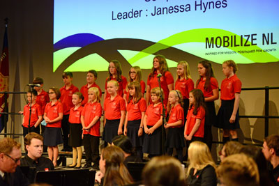A group of children singing