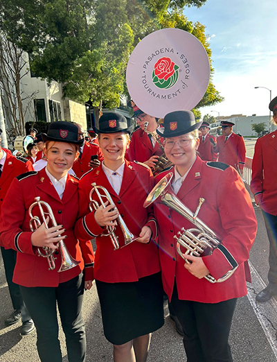 Erika-Shaye Gair (centre) with Canadian bandmates Mikayla Blackman and Annie Robertson at the 2023 Rose Bowl parade