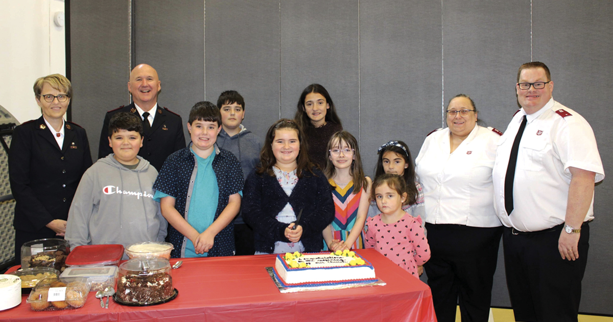 The cake cutting at the meal following the Sunday morning service