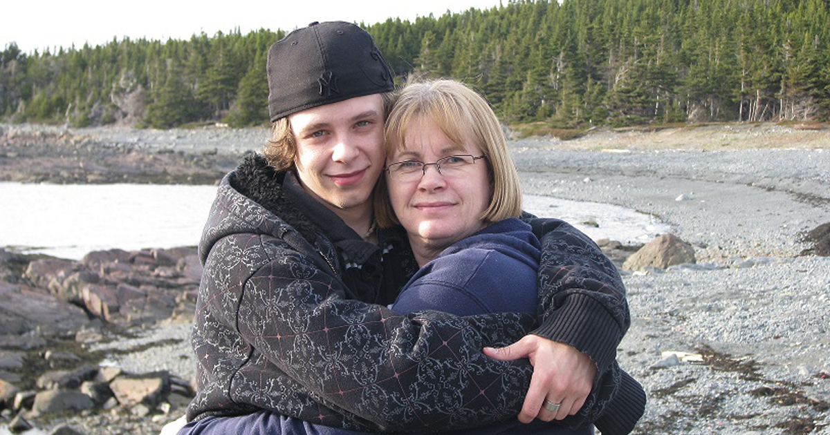 Mjr Judy Vincent hugs her son, Brock