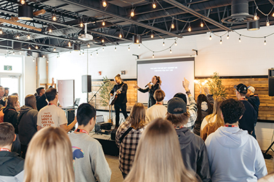 Youth worshipping with Brooke Nicholls.