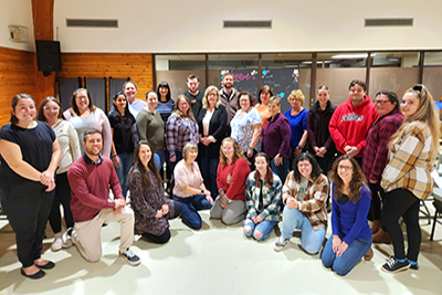 A group of staff pose together