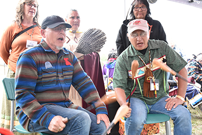 Jonathan and Dr. Casey Church, a member of the Pokagon Band of Potawatomi Indians of southwest Michigan, provide music at the Celebration of Culture pow wow