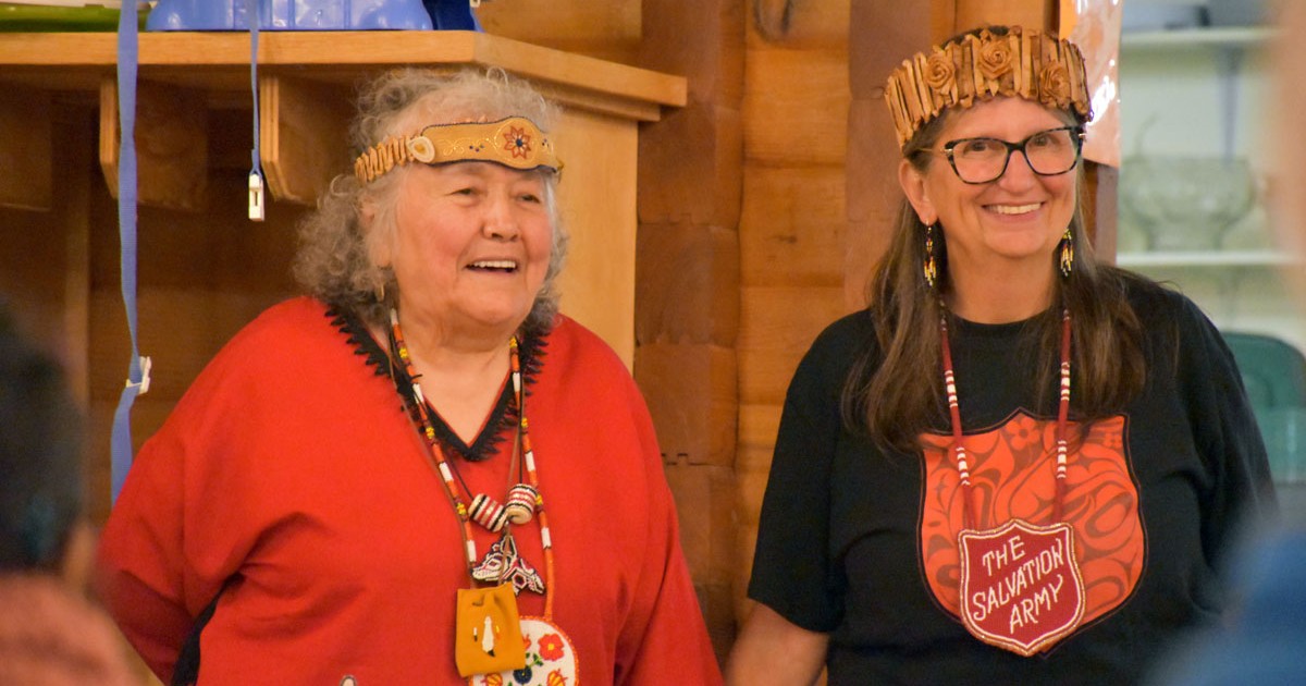 Two women standing together