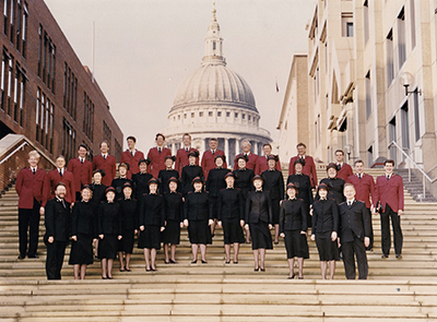 A large group of people standing before St. Paul's Cathedral