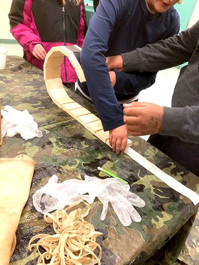 Youth work together in a woodworking class at Belleville Citadel