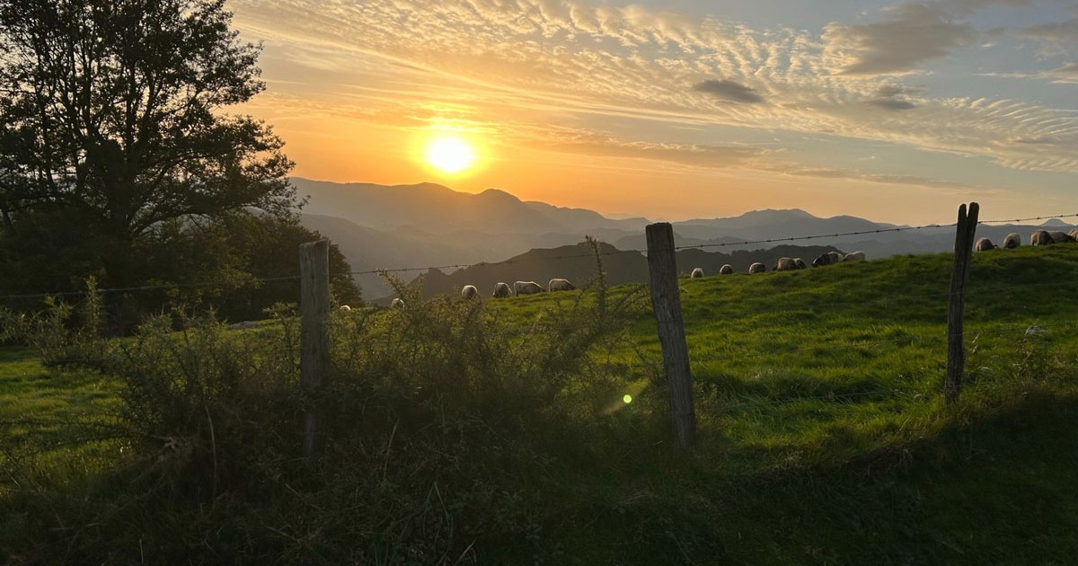 A sunrise over mountains