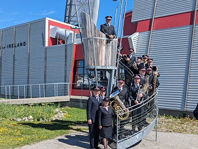 The Canadian Staff Band on the steps outside of the Empress of Ireland Museum