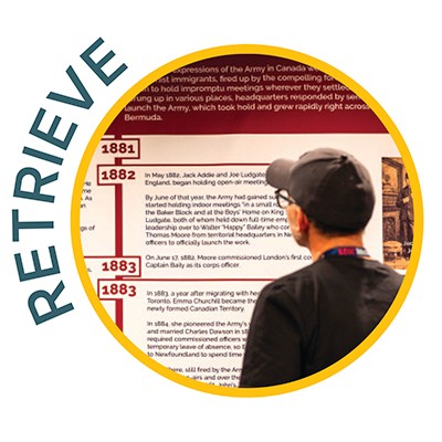 Retrieve - a person looks at a display