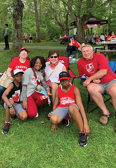 Joan and Gary celebrate Canada Day with friends. Back, from left, María, Joan Macneil-Jones and Gary Jones. Front, from left, Yinka and her two boys, Kunmi and Teju