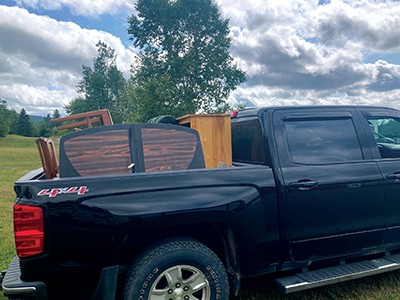 Gary’s pickup truck loaded with furniture for a family new to Canada