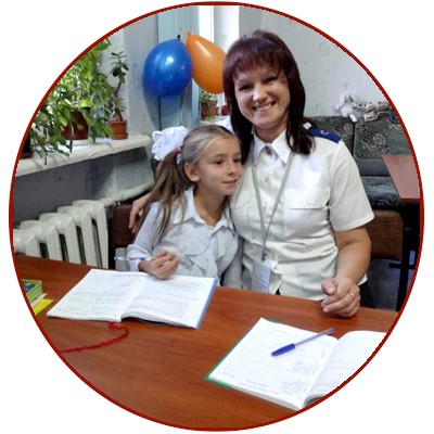 Iryna (right) with a child