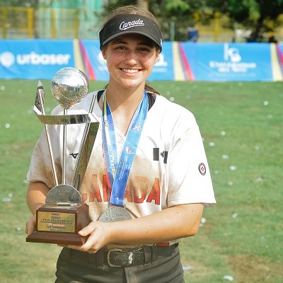 Caitlin holding a trophy