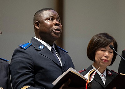 The cadets and auxiliary-captains read from Jeremiah 31 in five different languages, representing the various languages spoken by the session: English, French, Korean, Cantonese and Filipino. Cdt Alberto Theola reads in French