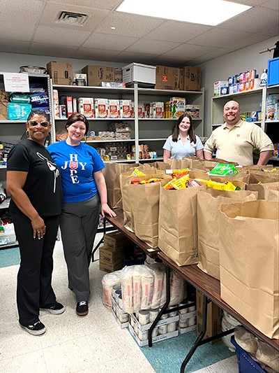 At the food bank with volunteer Leanne Hollis