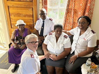 A group of five people sitting together