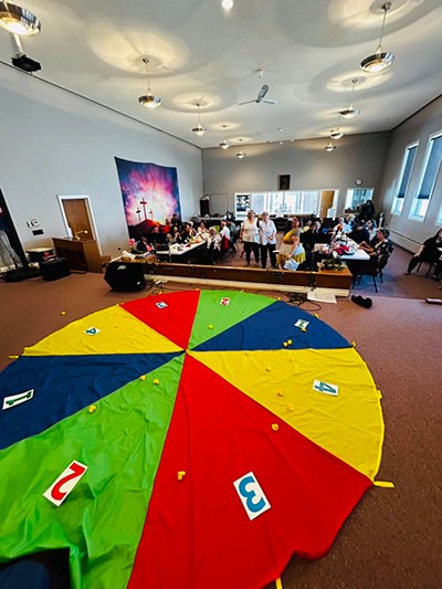 Members of the Brandon corps toss their ducks on a colourful target