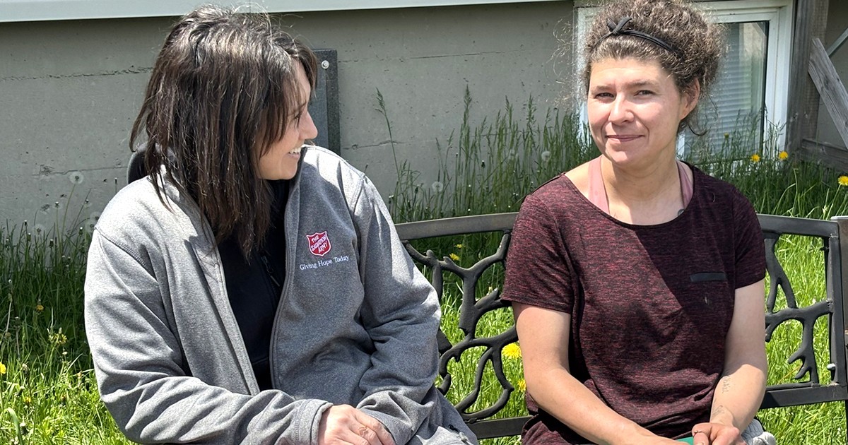 Megan Miner shares a moment with a community and family services client at Sussex CC, N.B.