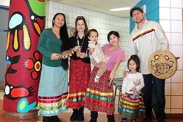 Janine Twoheart (left) and David Boulanger with their children