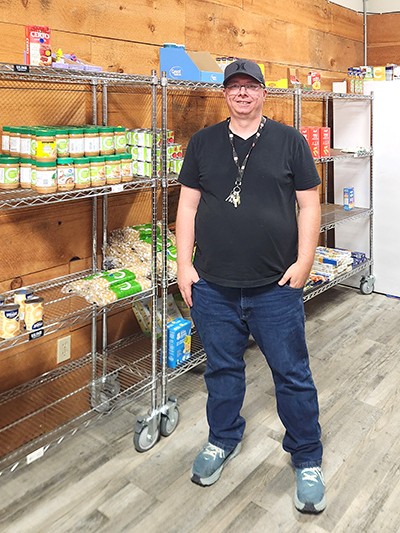 Ryan Daw in the food bank