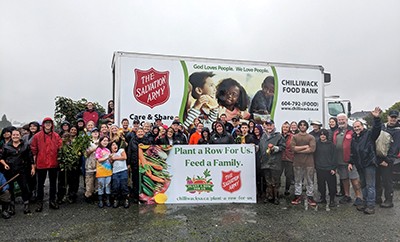 A team of students and community volunteers on harvest day