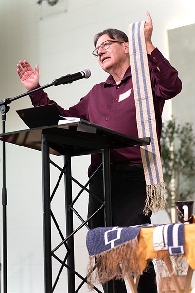 Adrian Jacobs leads a session on wampum belt teachings. Here, he displays a replica of the Two Row Wampum Belt