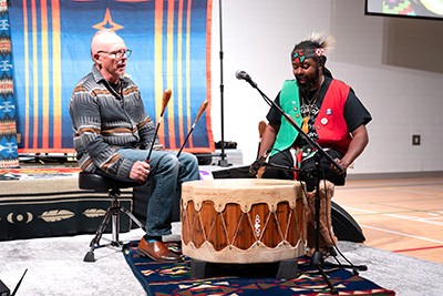 Jonathan Maracle (left) of Broken Walls performs an evening concert, accompanied by Kenneth Wallace