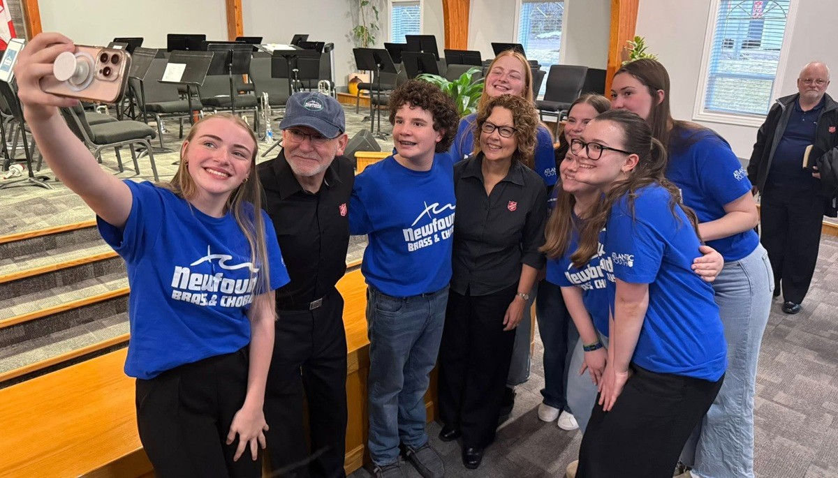 A group of people taking a selfie