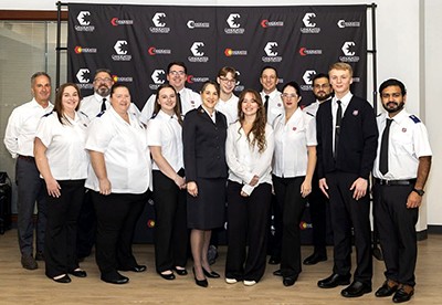 Powell (back row, second from right) at the Explore Your Call weekend in October 2025