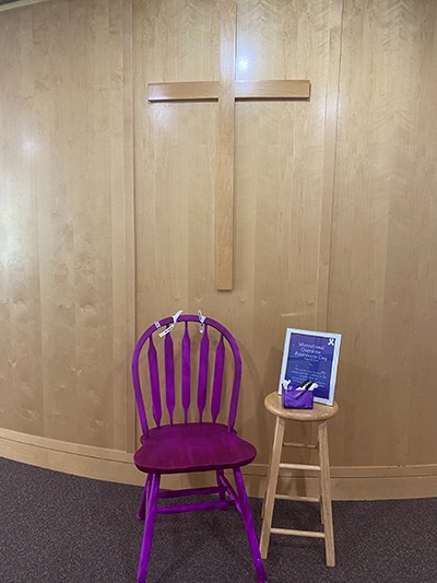 Purple chair with ribbons