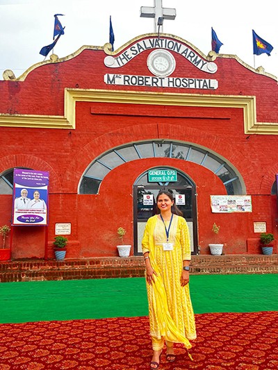 Kirandeep Kaur stands outside of The Salvation Army’s Mac Robert Hospital in Dhariwal, India