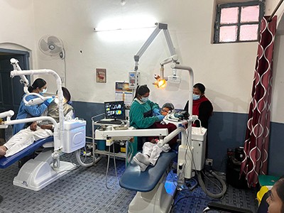 Staff at Mac Robert Hospital provide dental care to patients