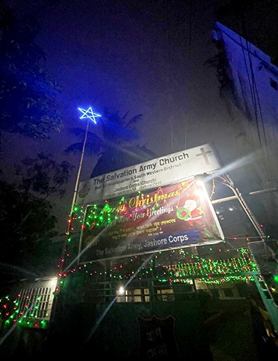 An illuminated star attached to the South-Western District headquarters / Jessore Corps