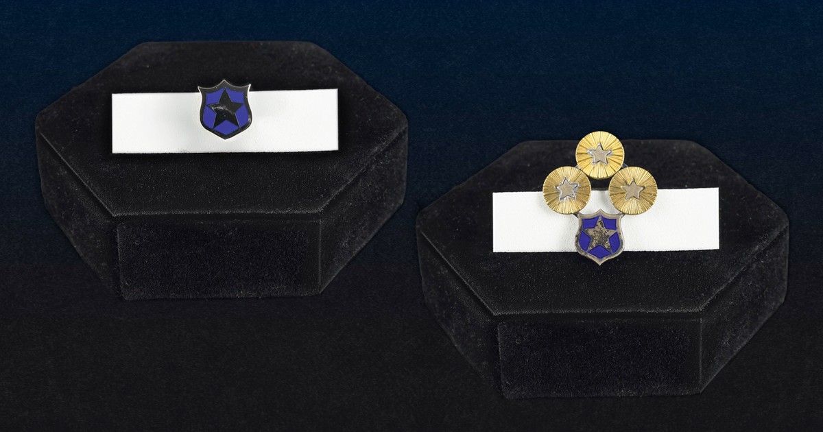 Two Order of the Silver Star pins, including the unique Silver Star pin with one blue enamel star and three gold stars that belonged to Brg Abbie MacGillivray