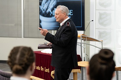 A man speaks to a group