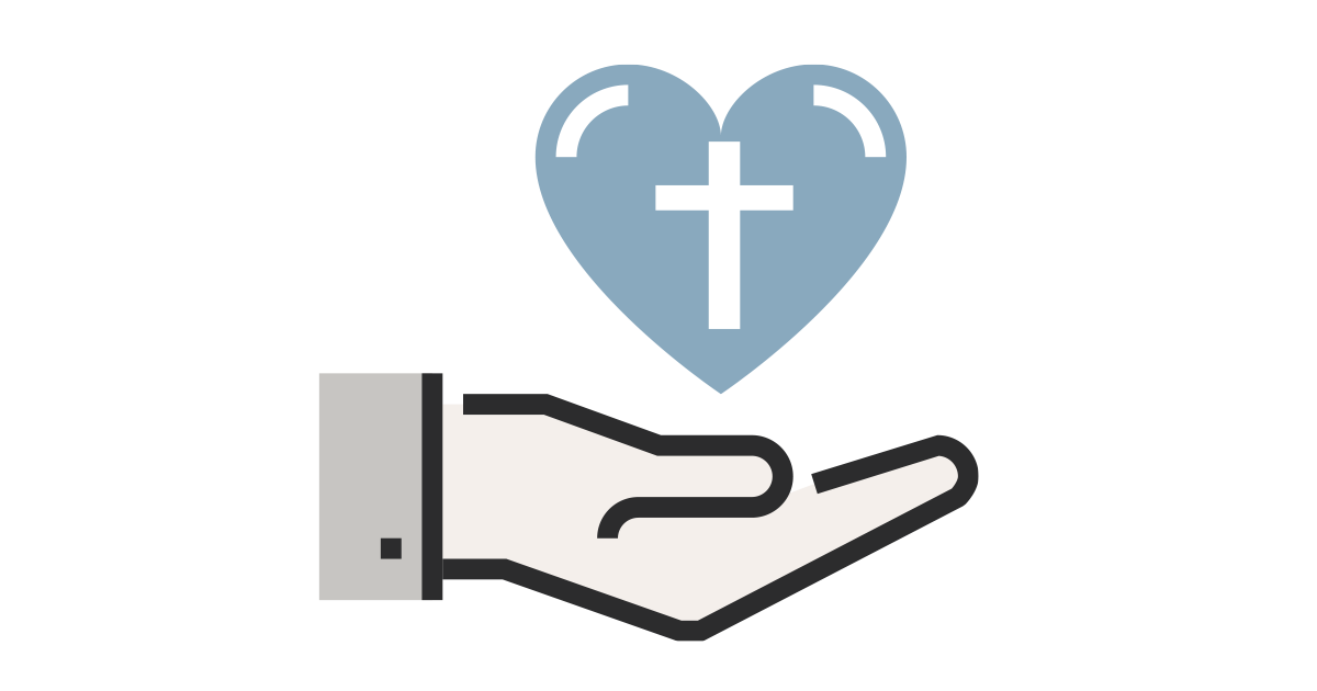 A hand holding a heart with a cross