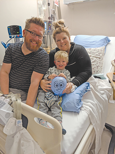 Ty and Felix visit Andrea in the hospital after the operation